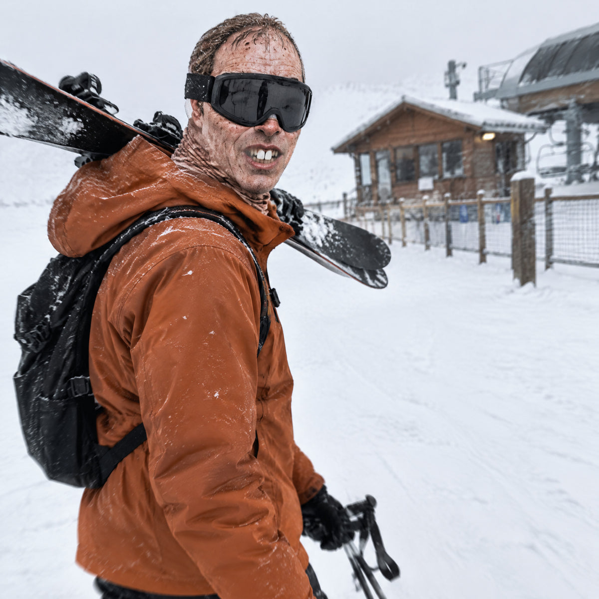 Chet mask worn by a skier with goggles down
